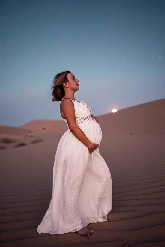 A pregnant woman in a white dress, like the one Revelation 12 uses to symbolize God's people through whom the man child Jesus Christ came