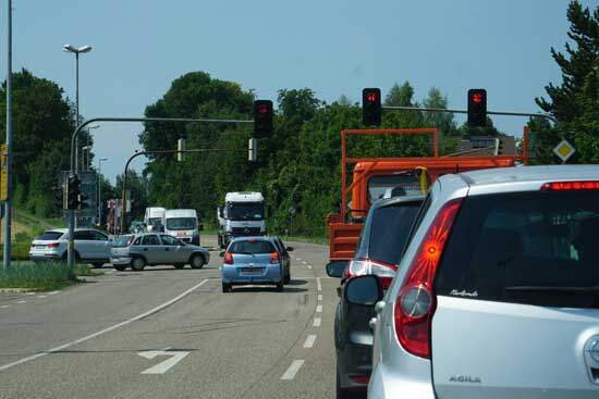 A red light at a traffic intersection, illustrating the way the Ten Commandments show us what we should do but don't enable us to do it