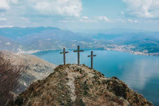 3 crosses on a hilltop near a lake as we learn how after Jesus' death and resurrection, disciples shared their faith abroad.