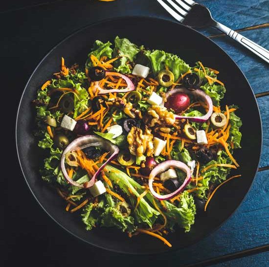 Haystacks, a popular Adventist meal, made from a variety of toppings with the base of corn chips, beans, or rice