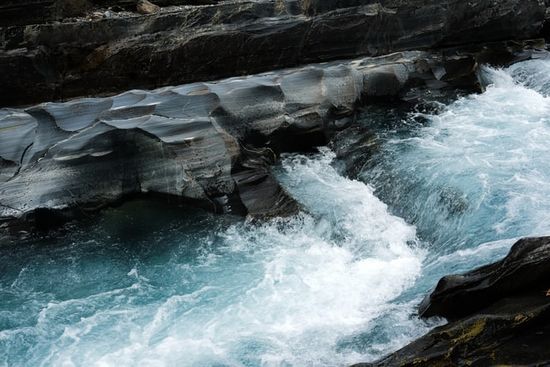 Water flowing over rocks, reminding us of how Moses struck the rock and water flowed out for the Israelites