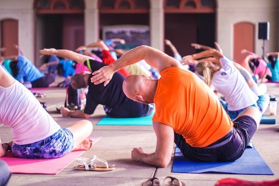 People at an Adventist lifestyle center stretching and exercising to improve their health