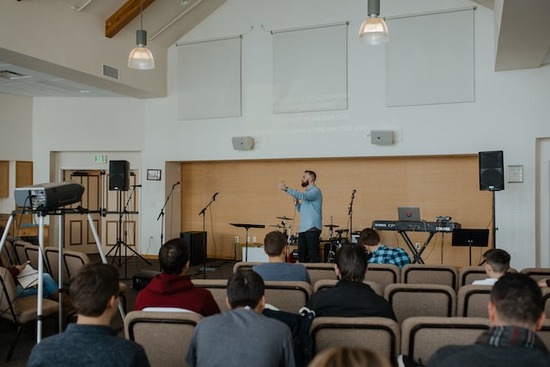 A pastor preaching a sermon and nurturing the local church members