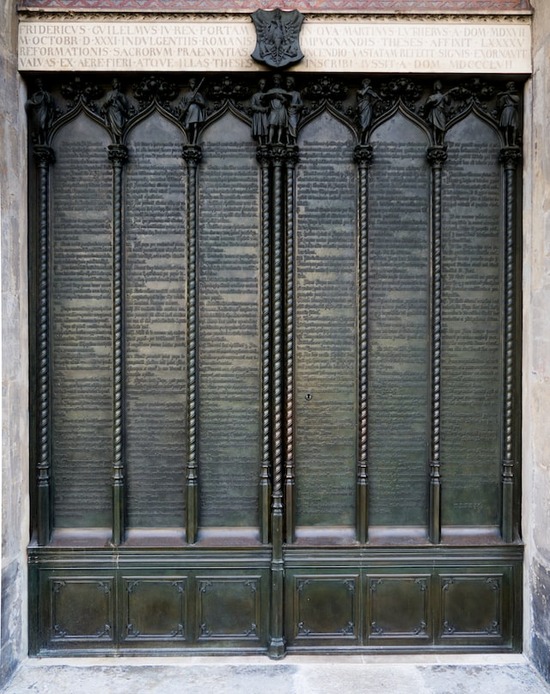 Doors of an old church in Europe where the Protestant Reformation began